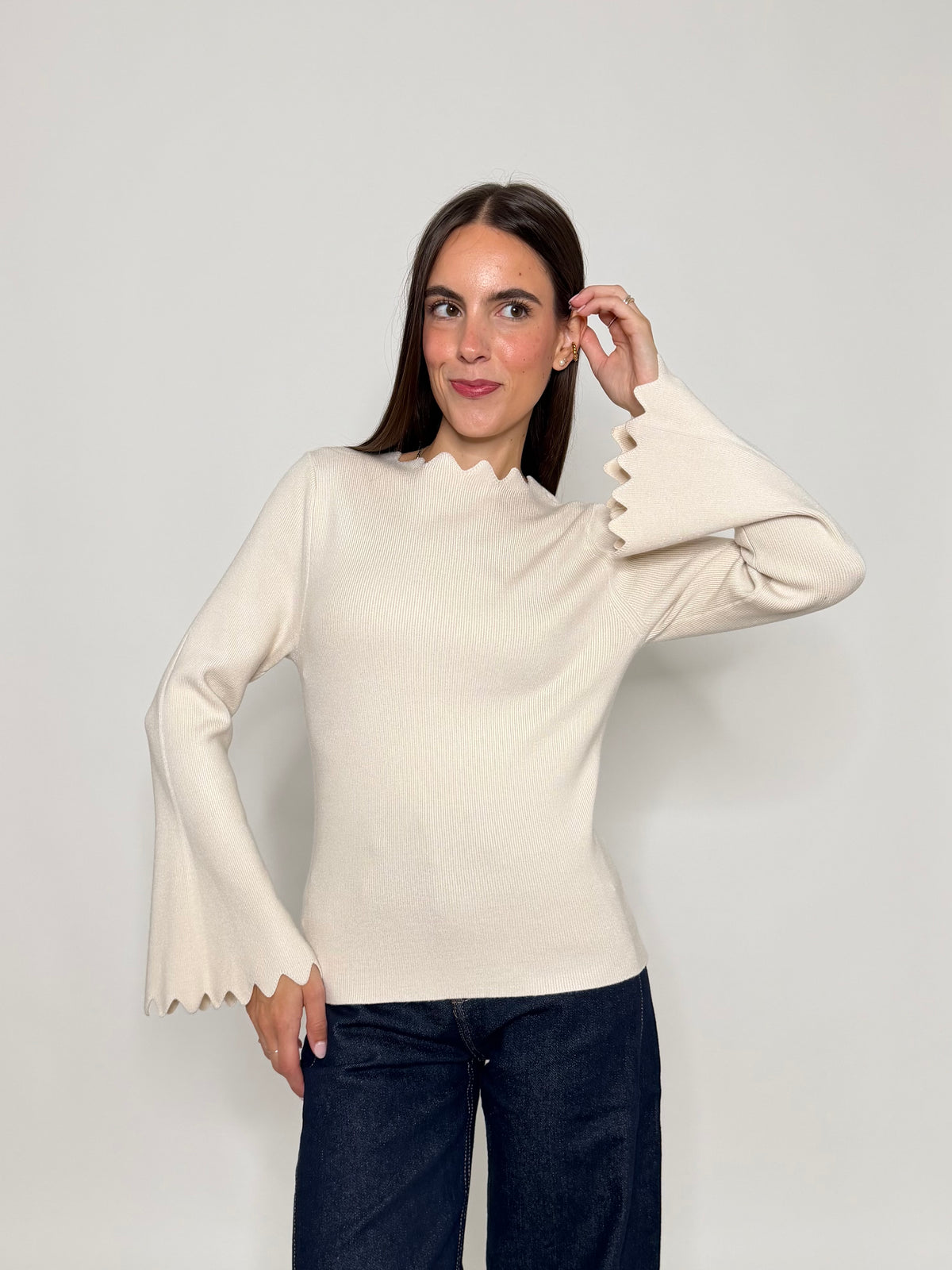Maglia in morbida viscosa zigzag con manica a campana panna