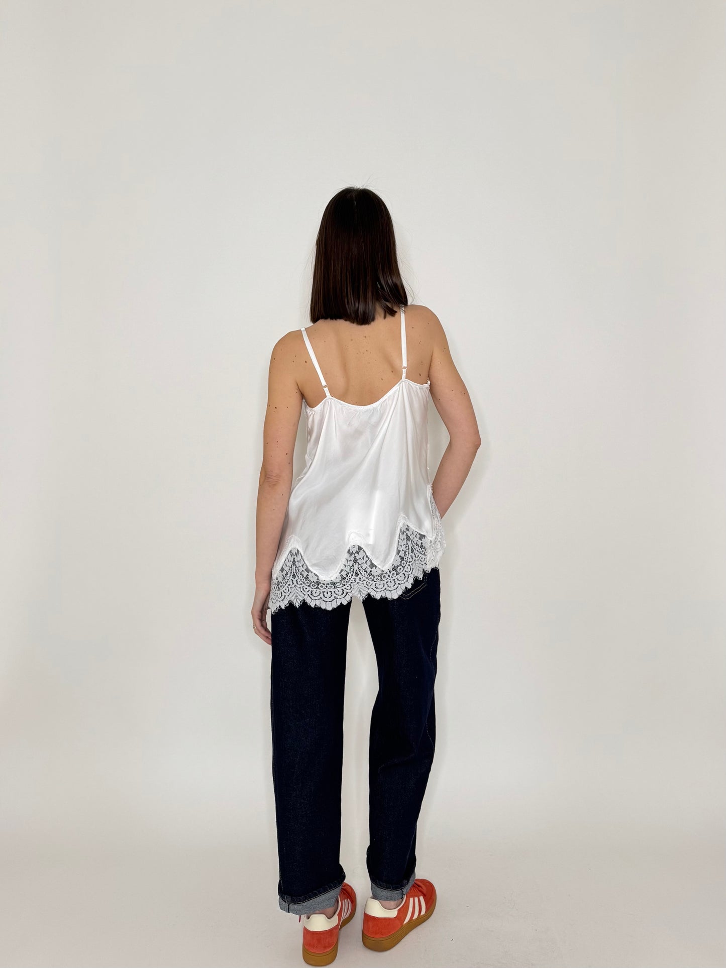 Top pizzo asimmetrico in 100% viscosa satin - Bianco