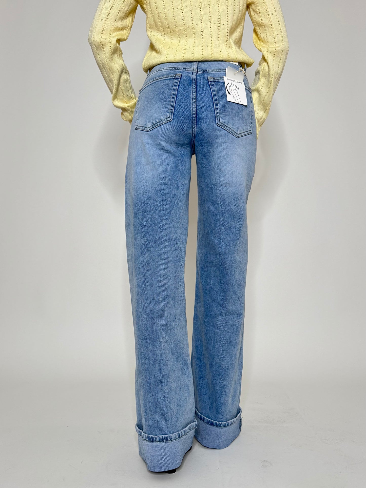 Jeans wide leg con risvolto