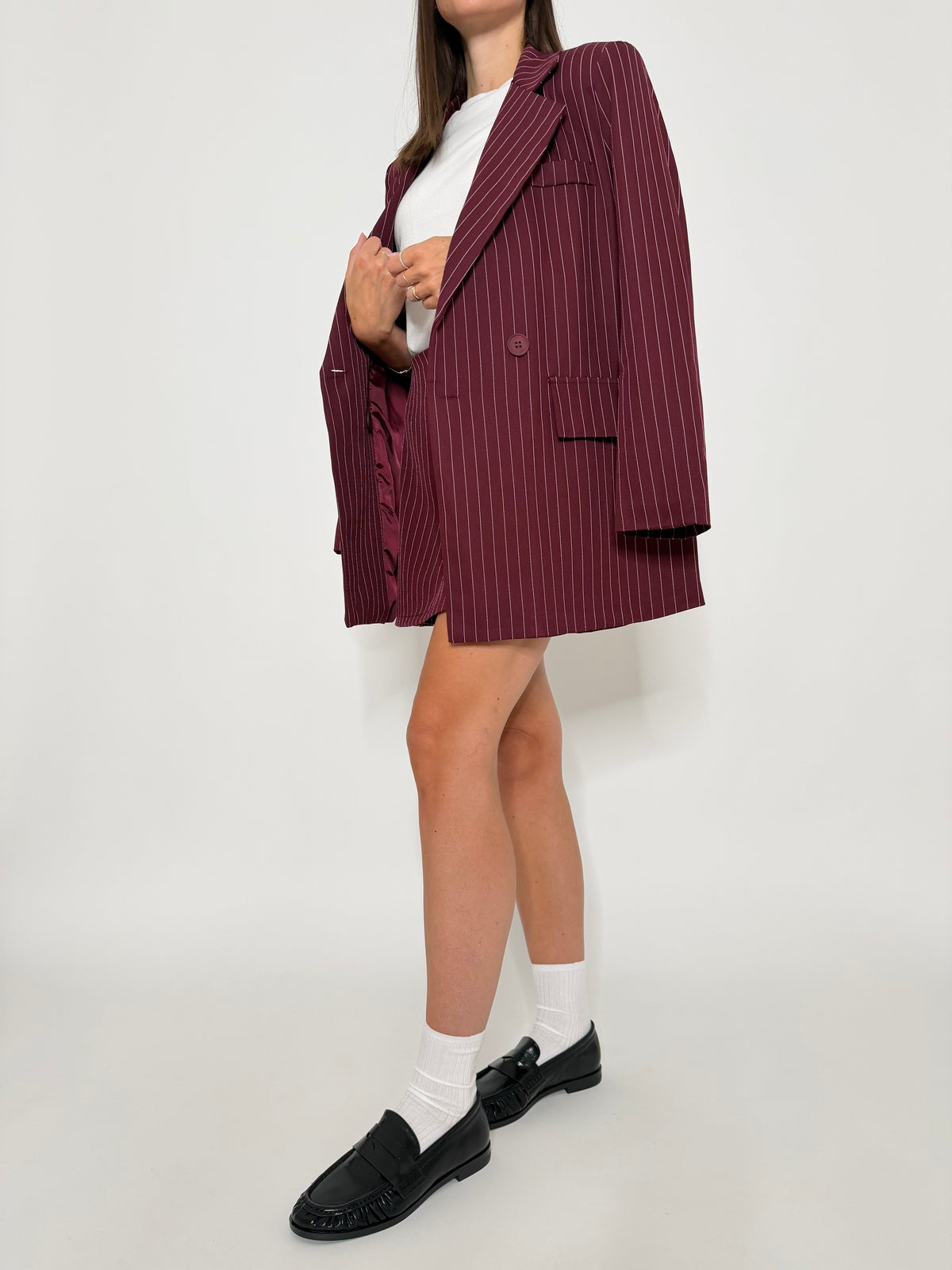 Gonna pantalone gessata