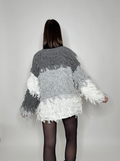Cardigan con frange in maglia