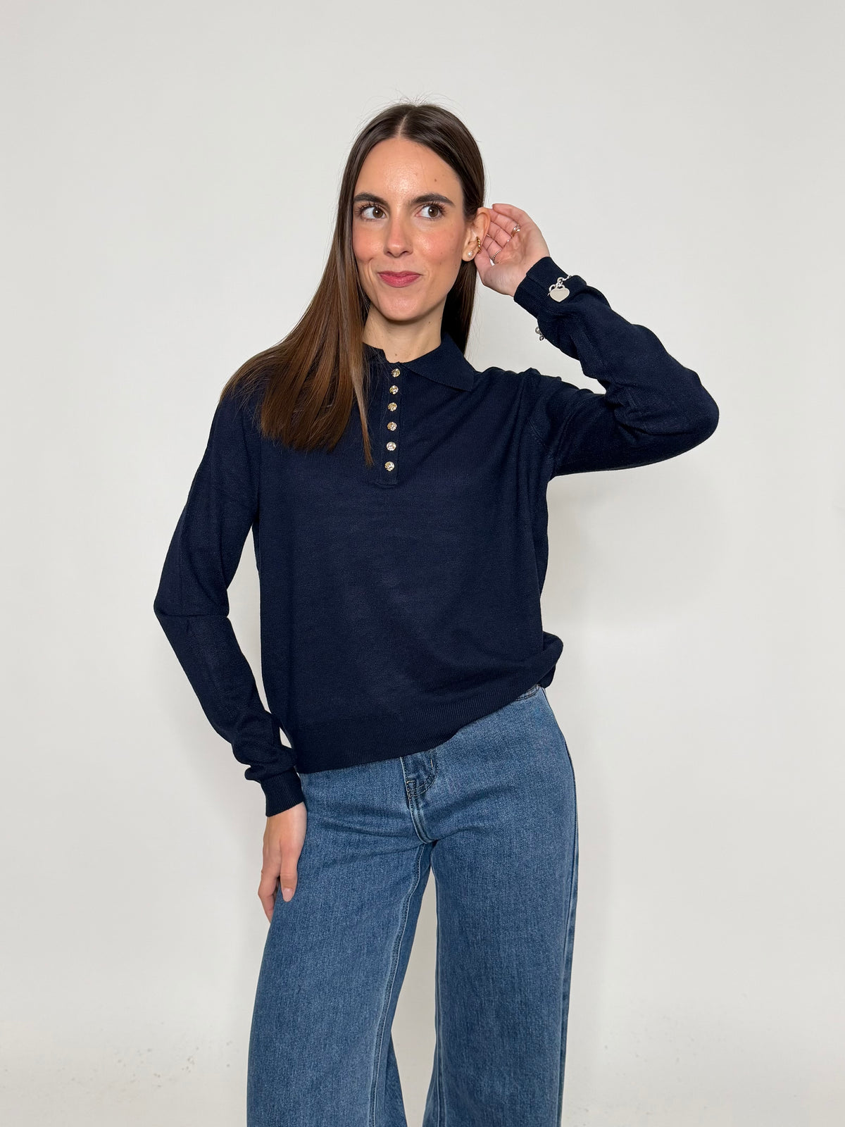 Polo in morbida viscosa con bottoncini gold blu