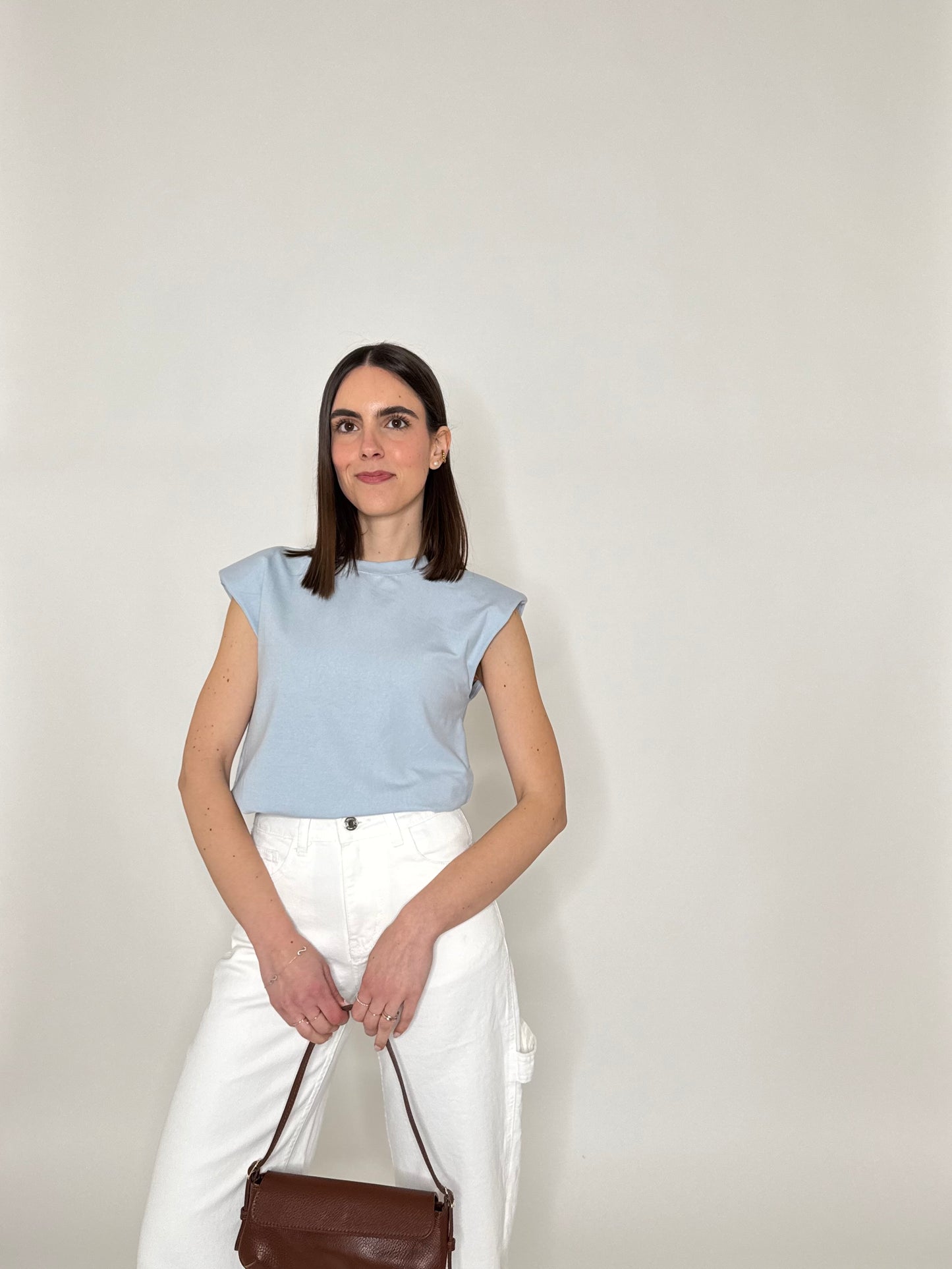 Maglia con spalline imbottite in cotone Celeste
