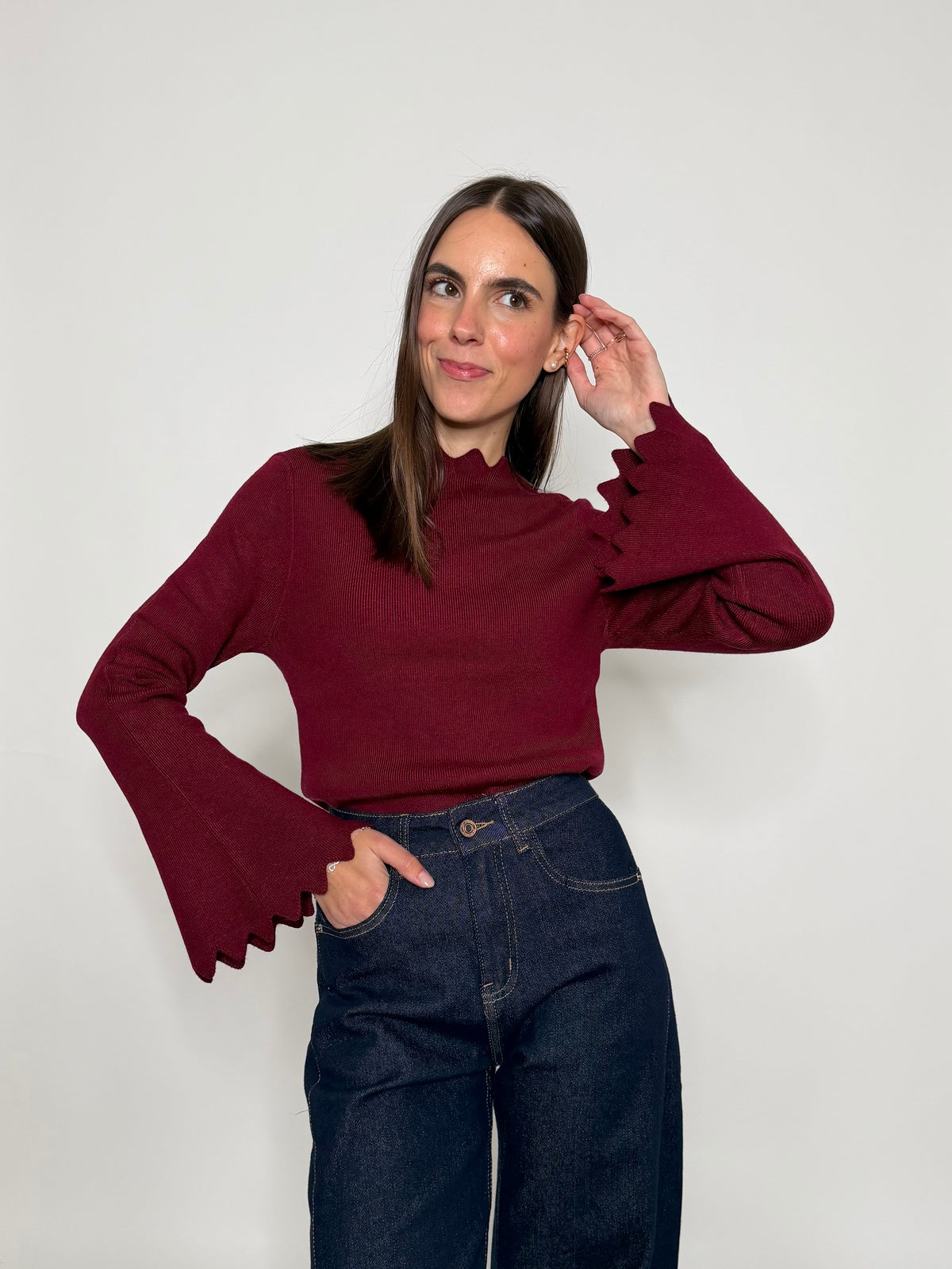 Maglia in morbida viscosa zigzag con manica a campana bordeaux