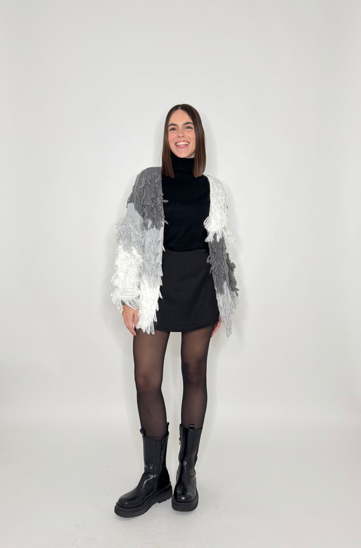 Cardigan con frange in maglia