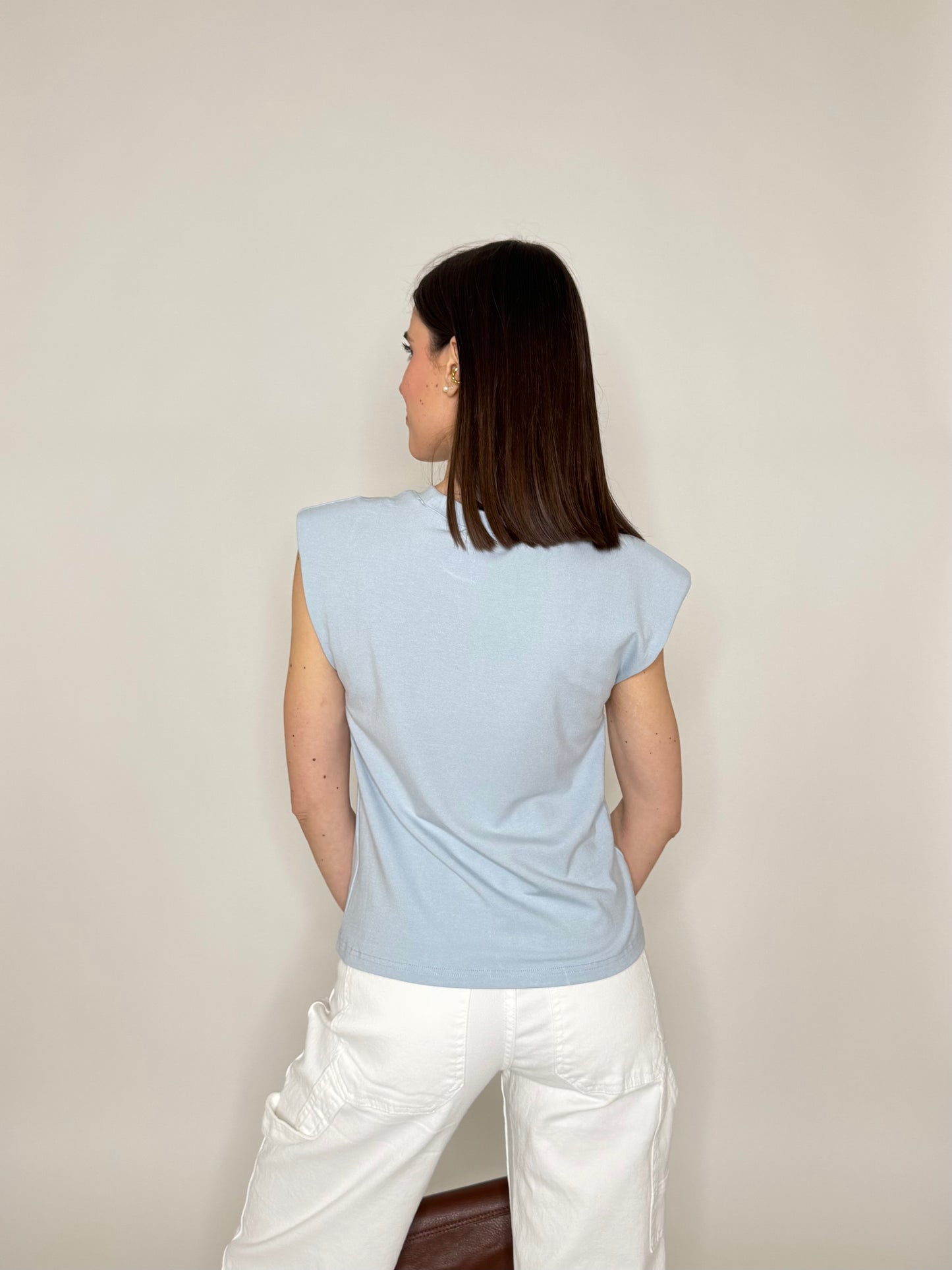 Maglia con spalline imbottite in cotone Celeste
