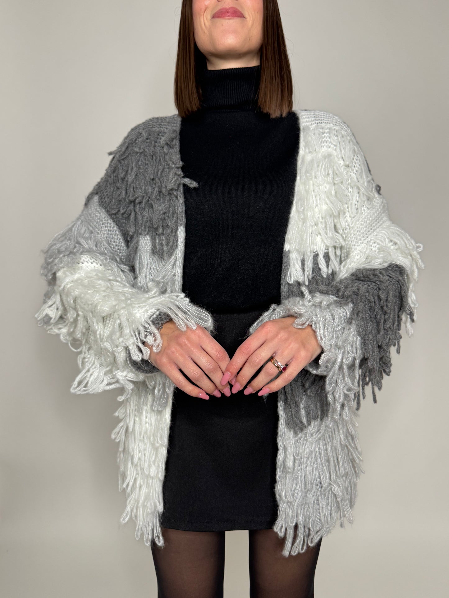 Cardigan con frange in maglia