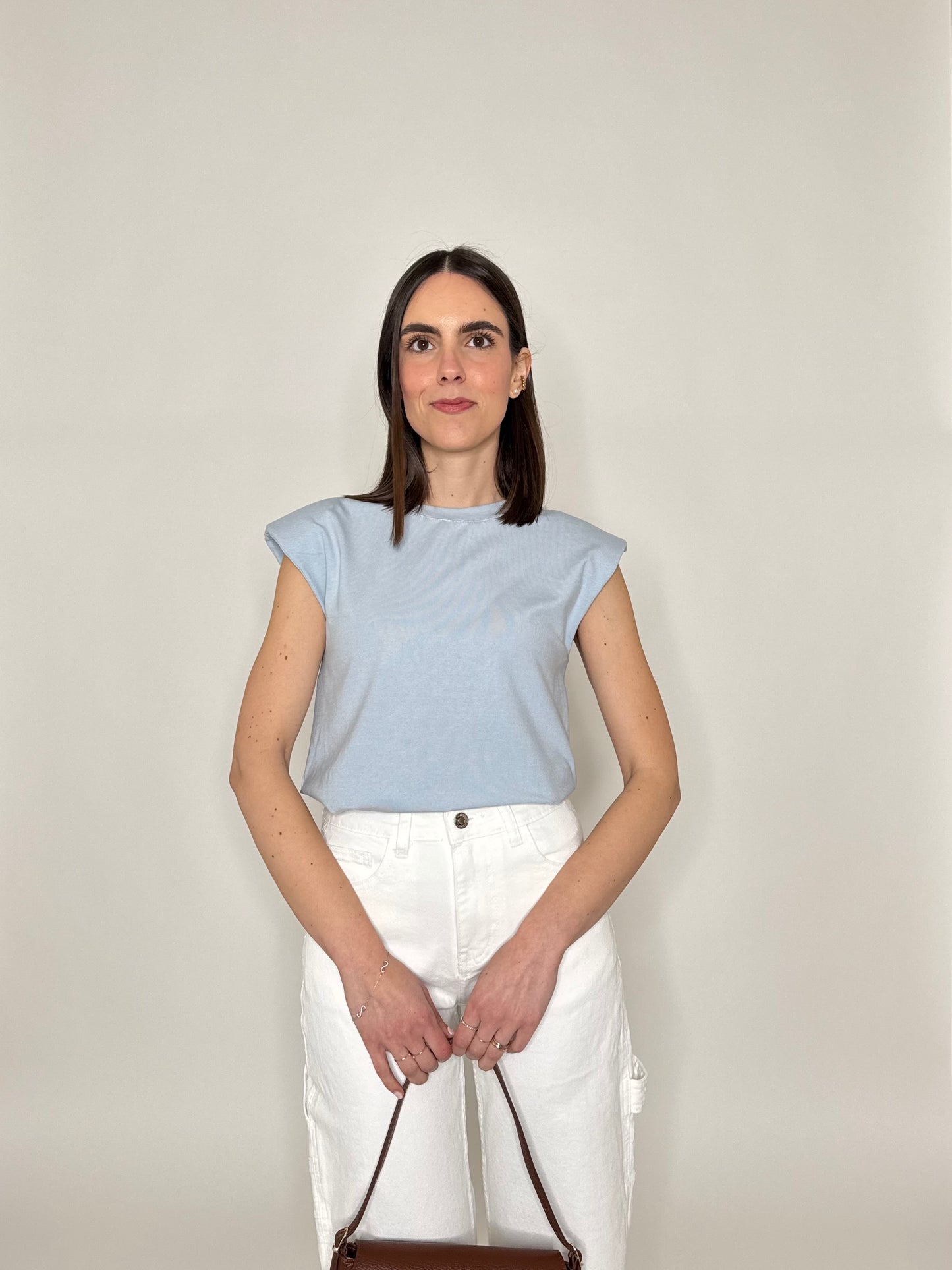 Maglia con spalline imbottite in cotone Celeste