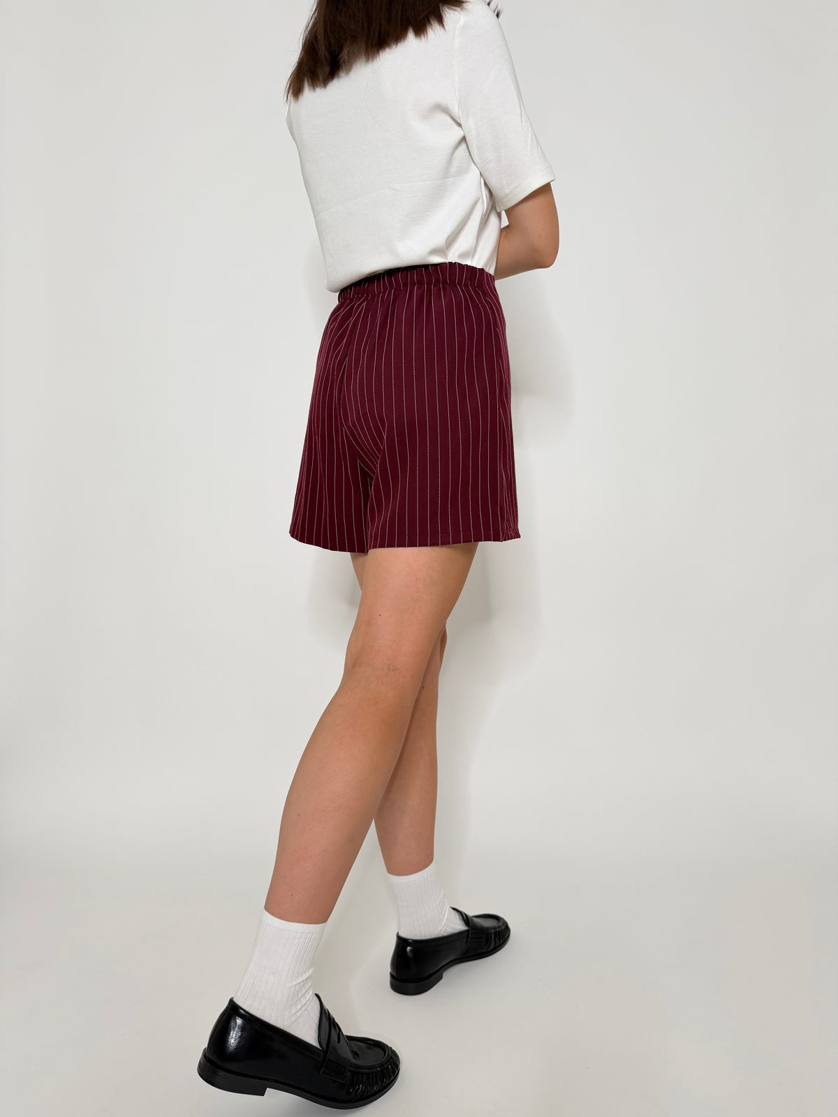 Gonna pantalone gessata