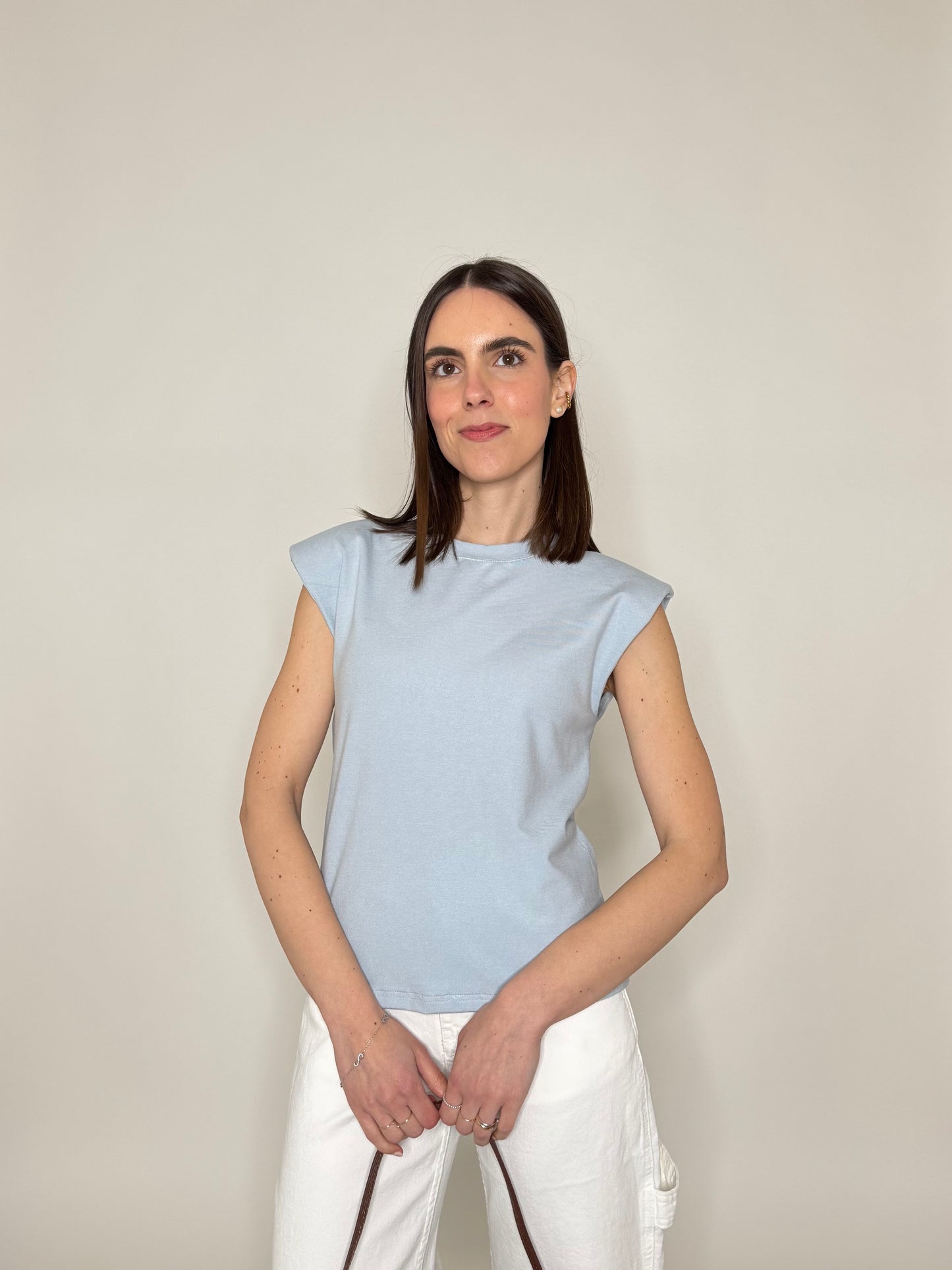 Maglia con spalline imbottite in cotone Celeste