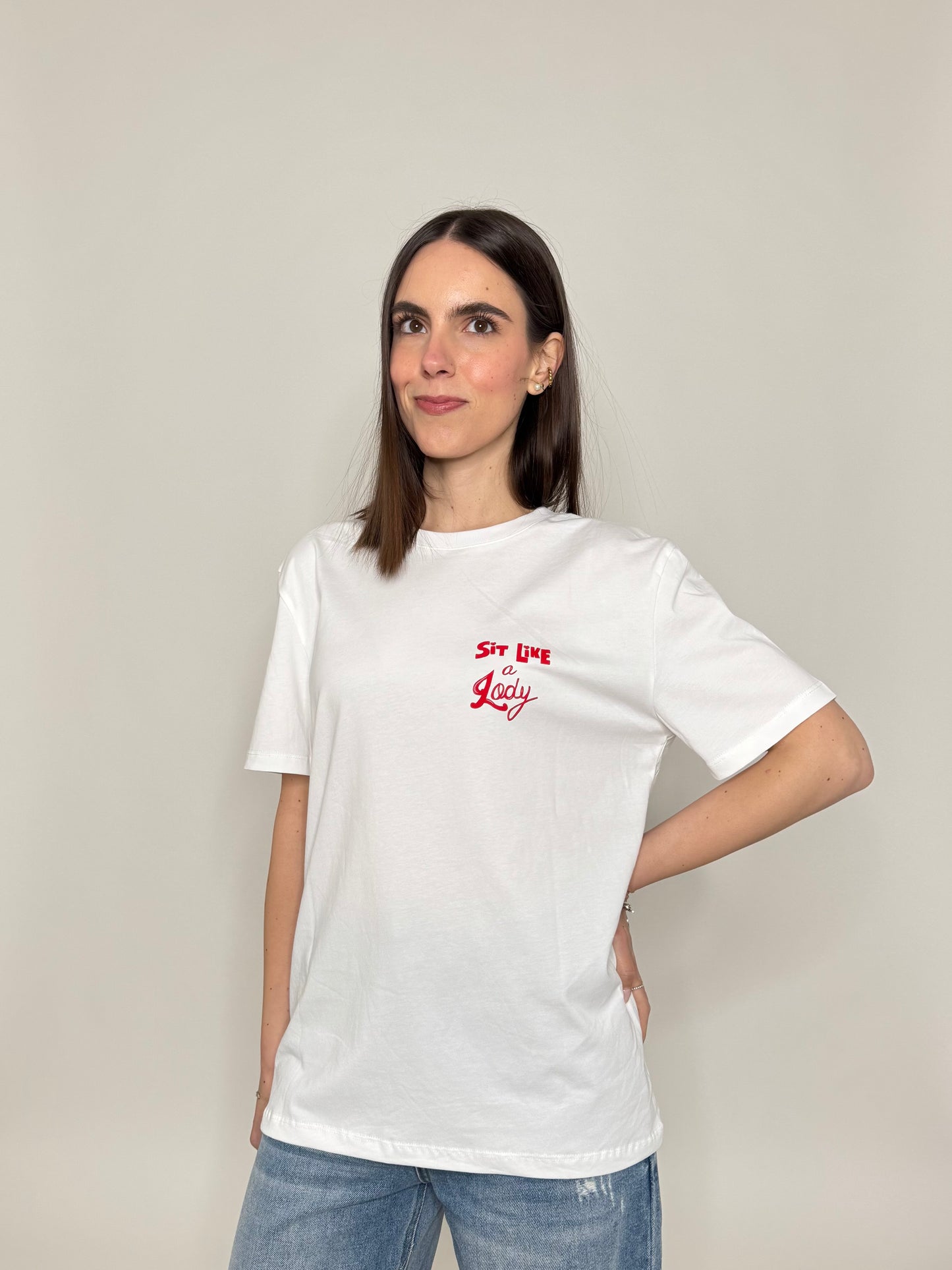 T-shirt in cotone con stampa "Sit like a Lady"