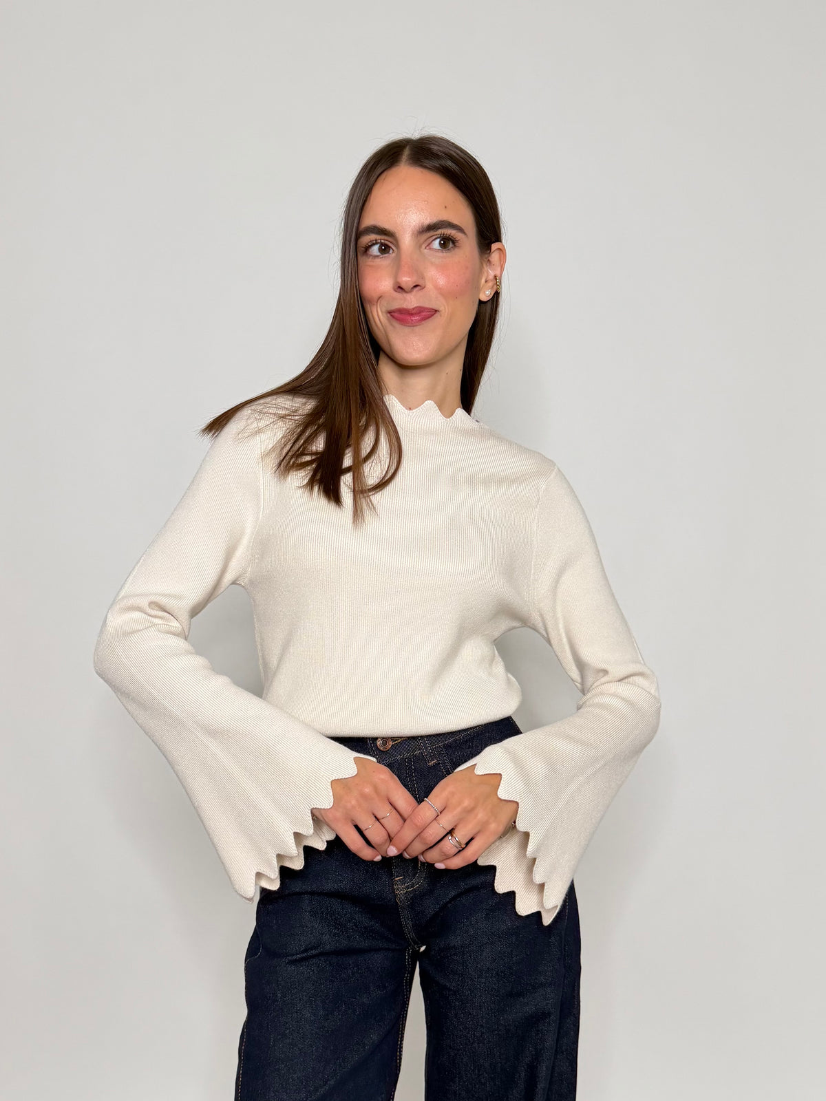 Maglia in morbida viscosa zigzag con manica a campana panna